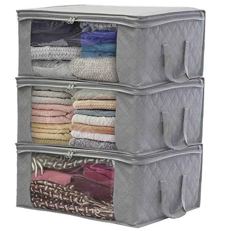 foldable clothes organizer

large storage box for bedding

waterproof storage container

fabric storage box with handles

storage bin with transparent window

space-saving storage solution

dustproof clothing storage

home storage box organizer

storage solution for closet

bedding and clothes storage bag

reinforced handle storage box