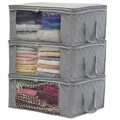 foldable clothes organizer

large storage box for bedding

waterproof storage container

fabric storage box with handles

storage bin with transparent window

space-saving storage solution

dustproof clothing storage

home storage box organizer

storage solution for closet

bedding and clothes storage bag

reinforced handle storage box
